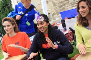 Students and staff taking part in the African drumming last year on the community outreach day