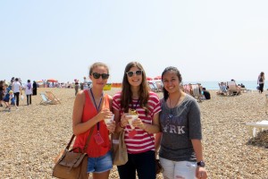 Students enjoying the sun on Brighton Beach
